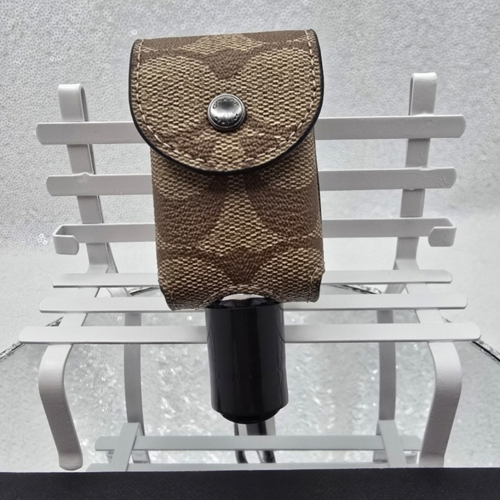 Coach Hand Sanitizer Holder Refillable Signature Logo Khaki Bag Charm